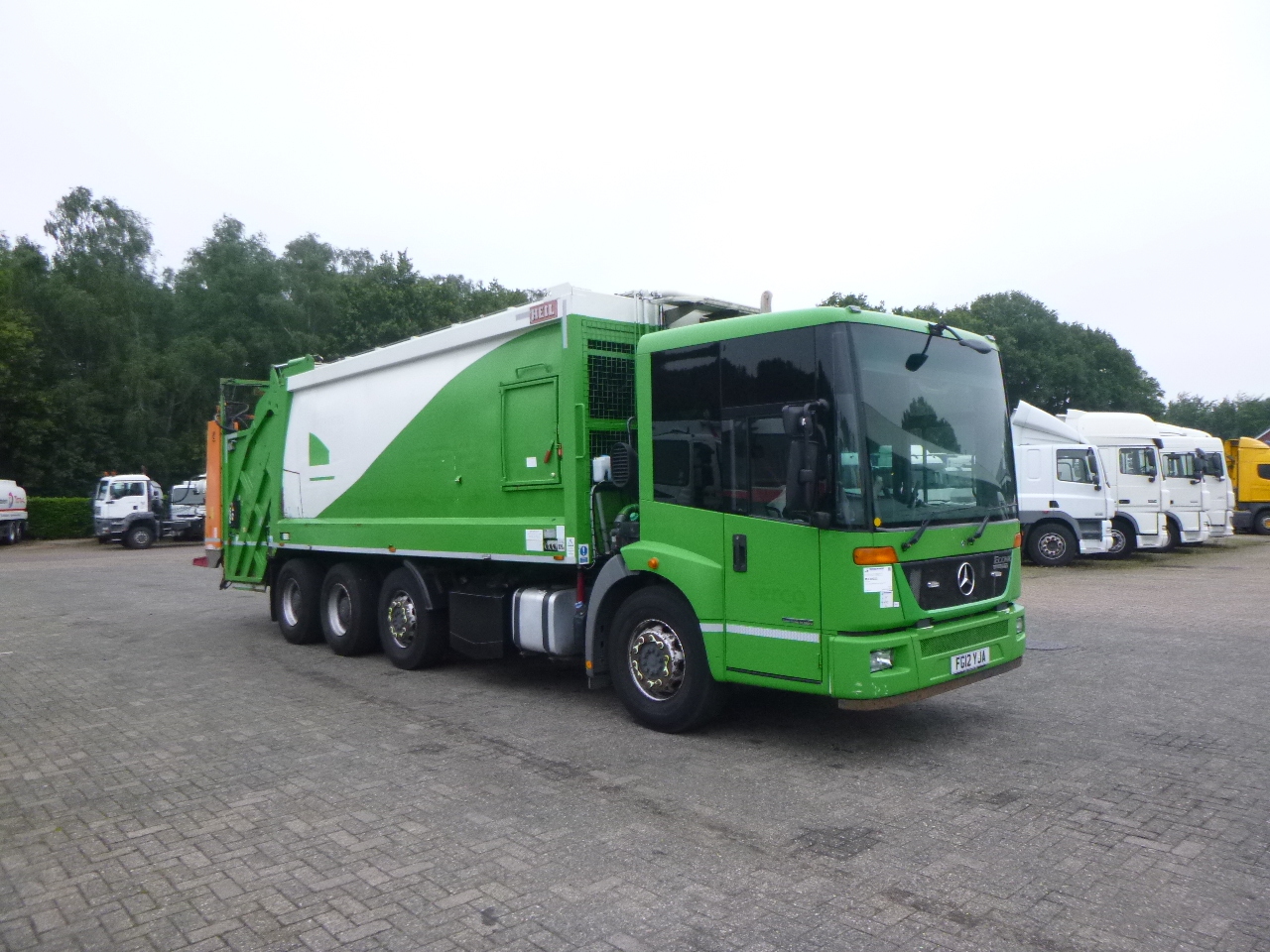 Camión de basura Mercedes Econic 3233 8X4 RHD Euro 5 refuse truck: foto 2