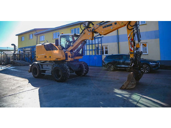 Excavadora de ruedas LIEBHERR A 910