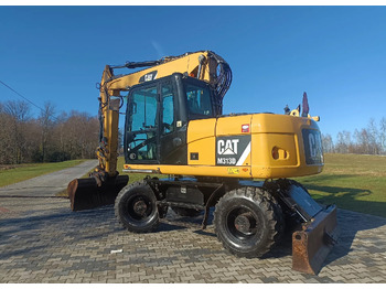 Excavadora de ruedas CATERPILLAR M313D