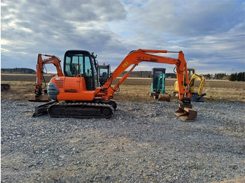 Miniexcavadora Case CX50 kallistajalla: foto 5