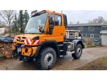 Camión caja abierta UNIMOG