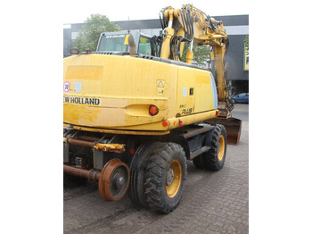 Excavadora de ruedas New Holland MH5 Plus: foto 5 Excavadora de ruedas New Holland MH5 Plus: foto 5