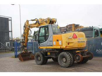 Excavadora de ruedas New Holland MH5 Plus: foto 3 Excavadora de ruedas New Holland MH5 Plus: foto 3