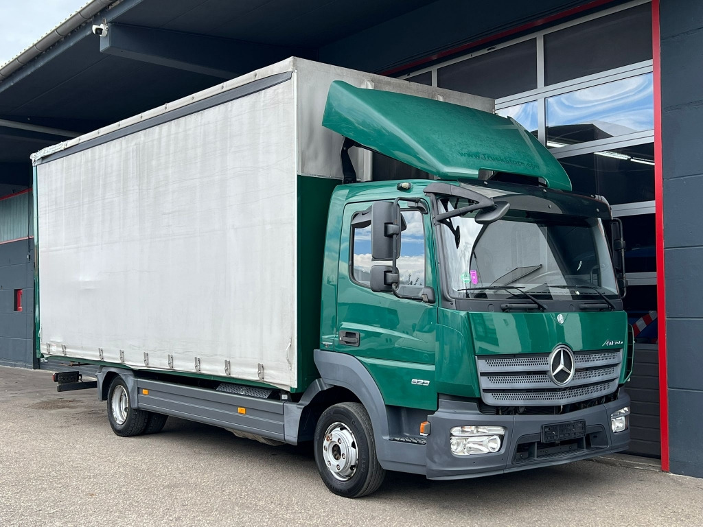 Mercedes-Benz Atego 823 Euro6 Klima 6,1m P+P AHK Orig. 164.tkm - Furgoneta con lona: foto 1 Mercedes-Benz Atego 823 Euro6 Klima 6,1m P+P AHK Orig. 164.tkm - Furgoneta con lona: foto 1