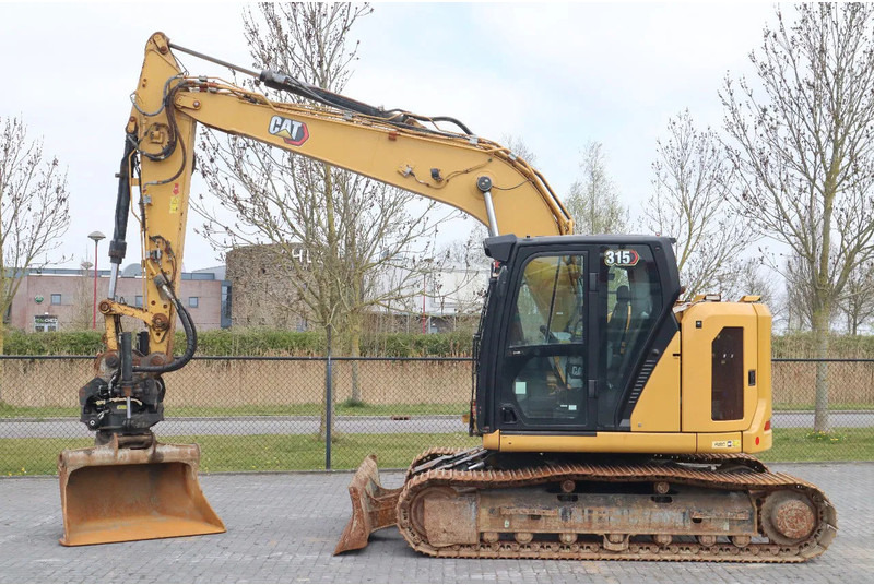 Caterpillar 315 07B | ROTOTILT | BUCKET | DOZERBLADE - Excavadora de cadenas: foto 1 Caterpillar 315 07B | ROTOTILT | BUCKET | DOZERBLADE - Excavadora de cadenas: foto 1