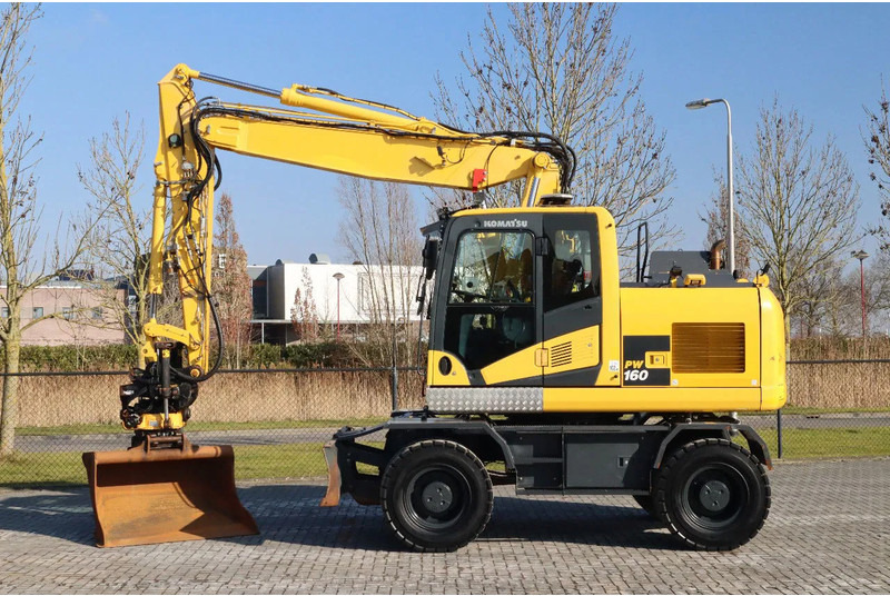 Komatsu PW160-11 | ENGCON TILTROTATOR | BUCKET | TRAILER HYDR. - Excavadora de ruedas: foto 1 Komatsu PW160-11 | ENGCON TILTROTATOR | BUCKET | TRAILER HYDR. - Excavadora de ruedas: foto 1