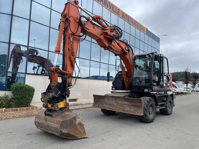Hitachi ZX140W-5B - Excavadora de ruedas: foto 1 Hitachi ZX140W-5B - Excavadora de ruedas: foto 1