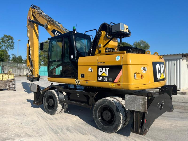 Caterpillar M318D MH - Manipulador de materiales: foto 1 Caterpillar M318D MH - Manipulador de materiales: foto 1