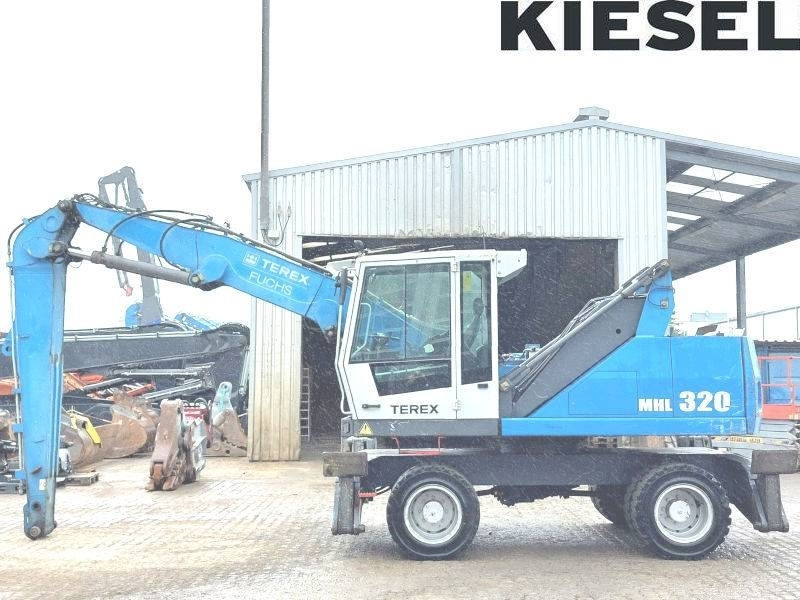Fuchs MHL 320 D - Manipulador de materiales: foto 1 Fuchs MHL 320 D - Manipulador de materiales: foto 1