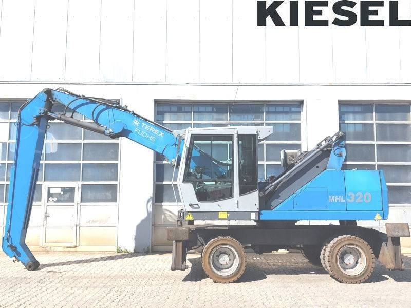 Fuchs MHL 320 D - Manipulador de materiales: foto 1 Fuchs MHL 320 D - Manipulador de materiales: foto 1