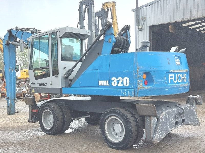 Fuchs MHL 320 D - Manipulador de materiales: foto 3 Fuchs MHL 320 D - Manipulador de materiales: foto 3