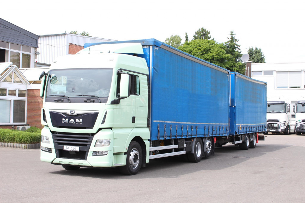 MAN TGX 26.460 Retarder Jumbo-Zug 120M3 Durchlade - Camión lona: foto 1 MAN TGX 26.460 Retarder Jumbo-Zug 120M3 Durchlade - Camión lona: foto 1