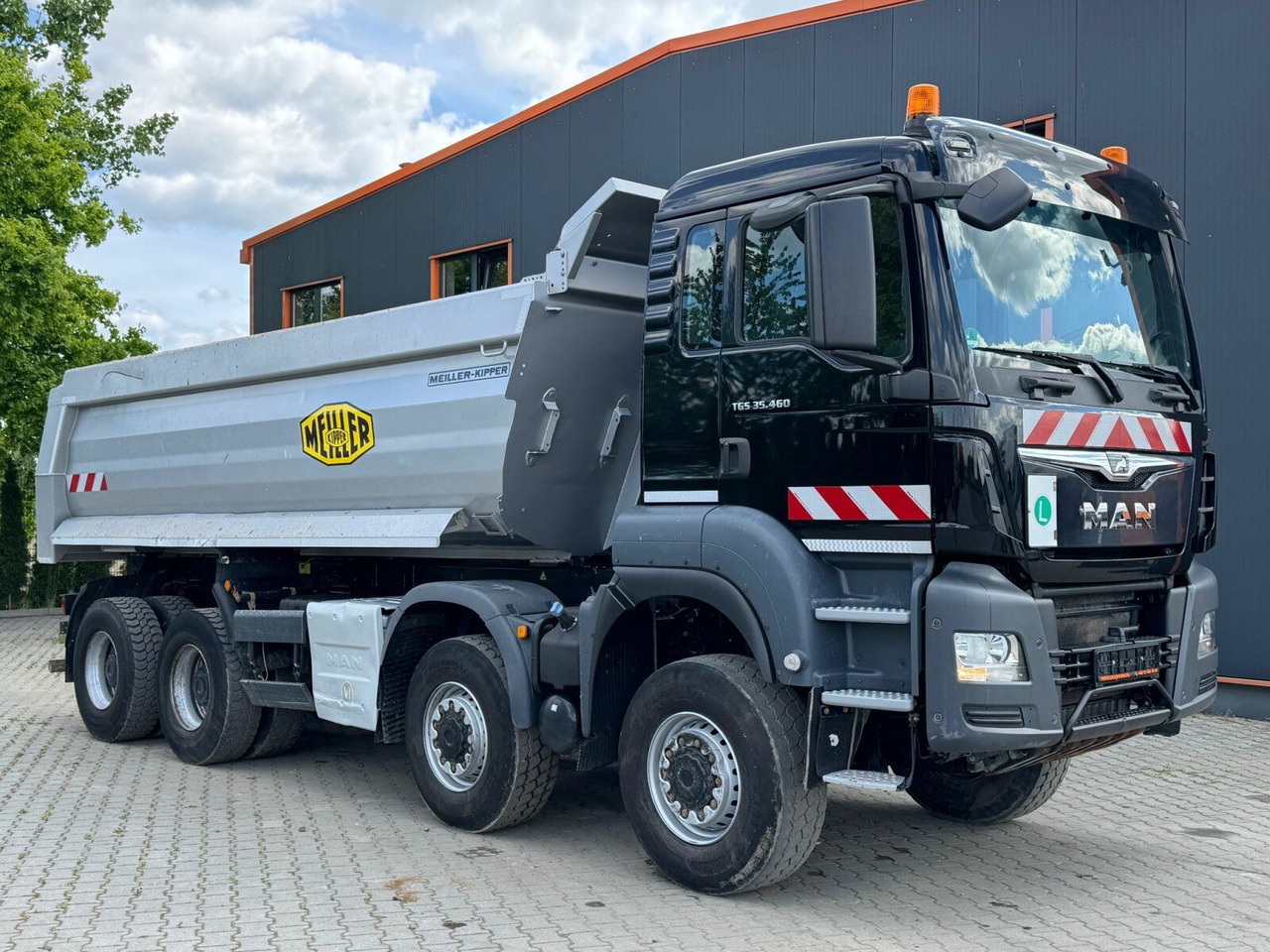 MAN TGS 35.460 8x6 BB Muldenkipper Meiller - Camión portacontenedor de cadenas: foto 1 MAN TGS 35.460 8x6 BB Muldenkipper Meiller - Camión portacontenedor de cadenas: foto 1