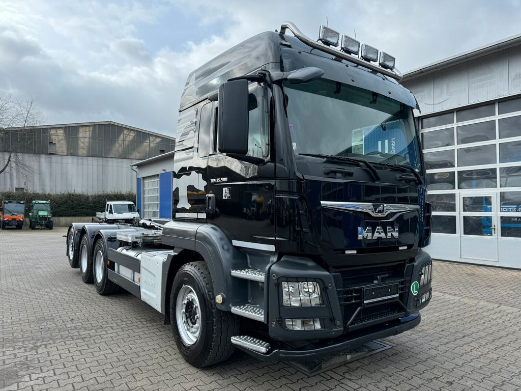 Camión multibasculante MAN TGS 35.500 8x4-4 BL Abrollkipper Stummer 25 Ton: foto 1