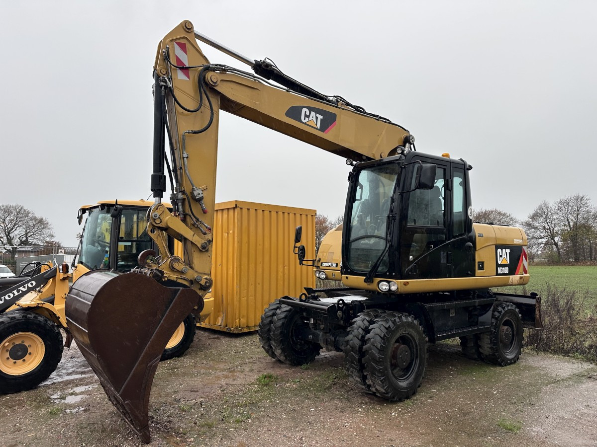 CATERPILLAR M 316 D full Hydr. Top Zustand German machine ! - Excavadora de ruedas: foto 1 CATERPILLAR M 316 D full Hydr. Top Zustand German machine ! - Excavadora de ruedas: foto 1