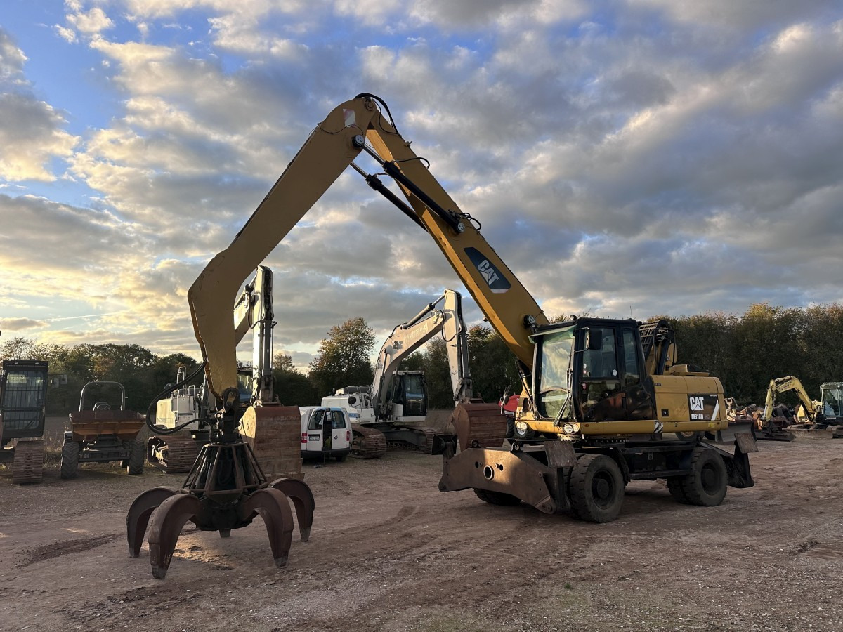 CATERPILLAR M 318 MH mit Greifer Kein 3022 3026 320 322 - Manipulador de materiales: foto 1 CATERPILLAR M 318 MH mit Greifer Kein 3022 3026 320 322 - Manipulador de materiales: foto 1