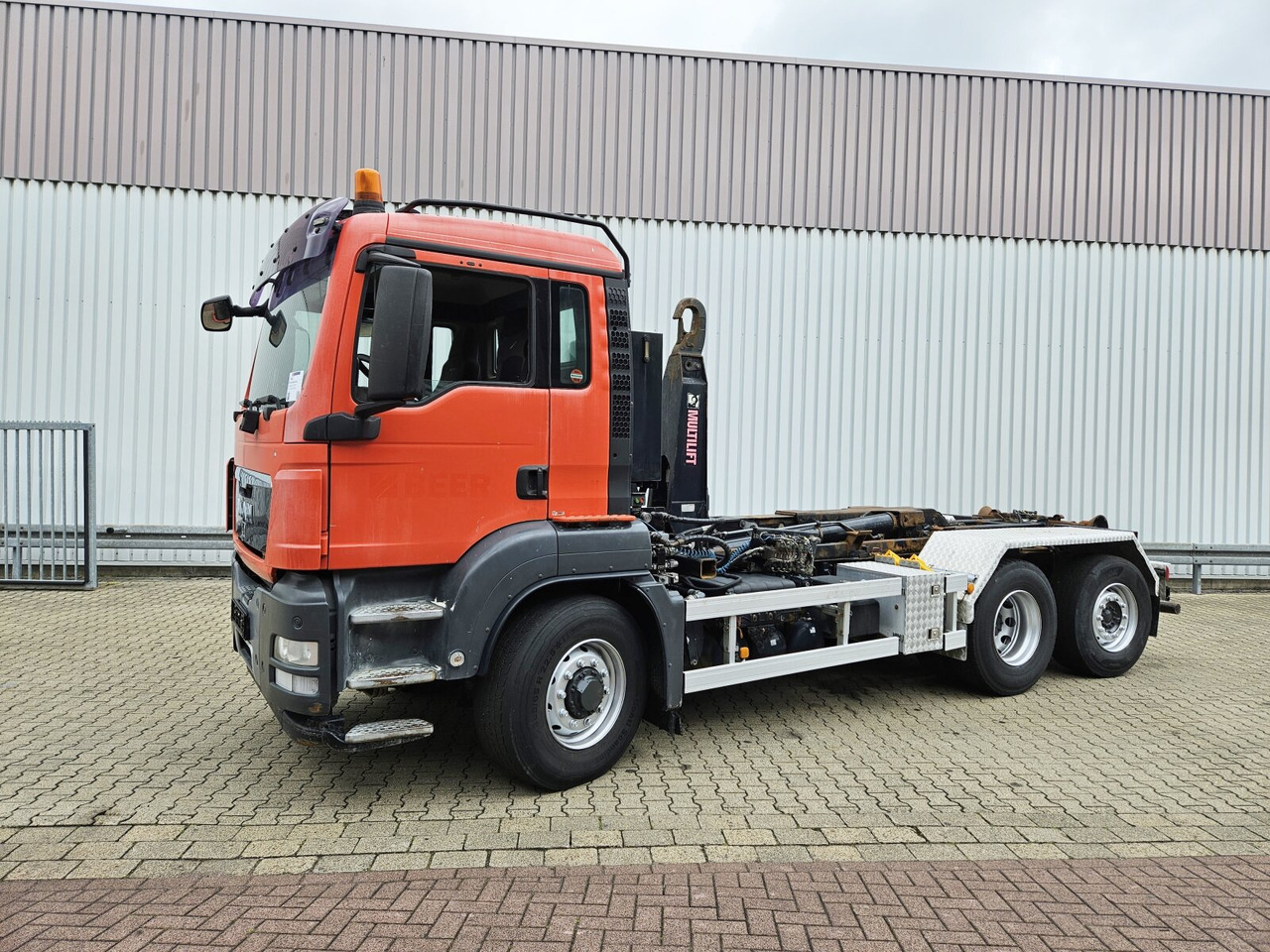 MAN TGS 26.480 6x4H-4 BL TGS 26.480 6x4H-4 BL, Multilift Abroller HydroDrive, Lenk-/Liftachse, Wechselfahrzeug - Camión multibasculante: foto 1 MAN TGS 26.480 6x4H-4 BL TGS 26.480 6x4H-4 BL, Multilift Abroller HydroDrive, Lenk-/Liftachse, Wechselfahrzeug - Camión multibasculante: foto 1