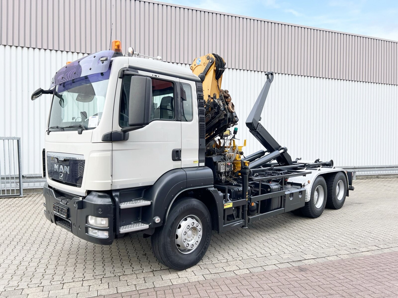 MAN TGS 33.440 6X4 BL TGS 33.440 6X4 BL mit Kran Effer 165-3S, Funk - Camión multibasculante, Camión grúa: foto 1 MAN TGS 33.440 6X4 BL TGS 33.440 6X4 BL mit Kran Effer 165-3S, Funk - Camión multibasculante, Camión grúa: foto 1