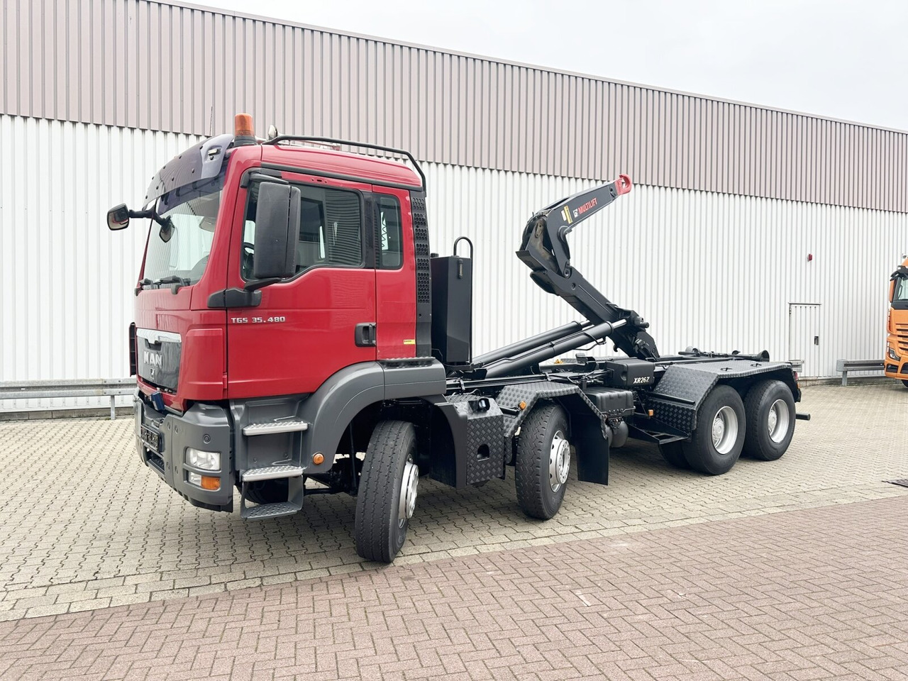 MAN TGS 35.480 8X4 BL TGS 35.400 8x4 BL, Schub-Knick bis 6,5m Container - Camión multibasculante: foto 1 MAN TGS 35.480 8X4 BL TGS 35.400 8x4 BL, Schub-Knick bis 6,5m Container - Camión multibasculante: foto 1