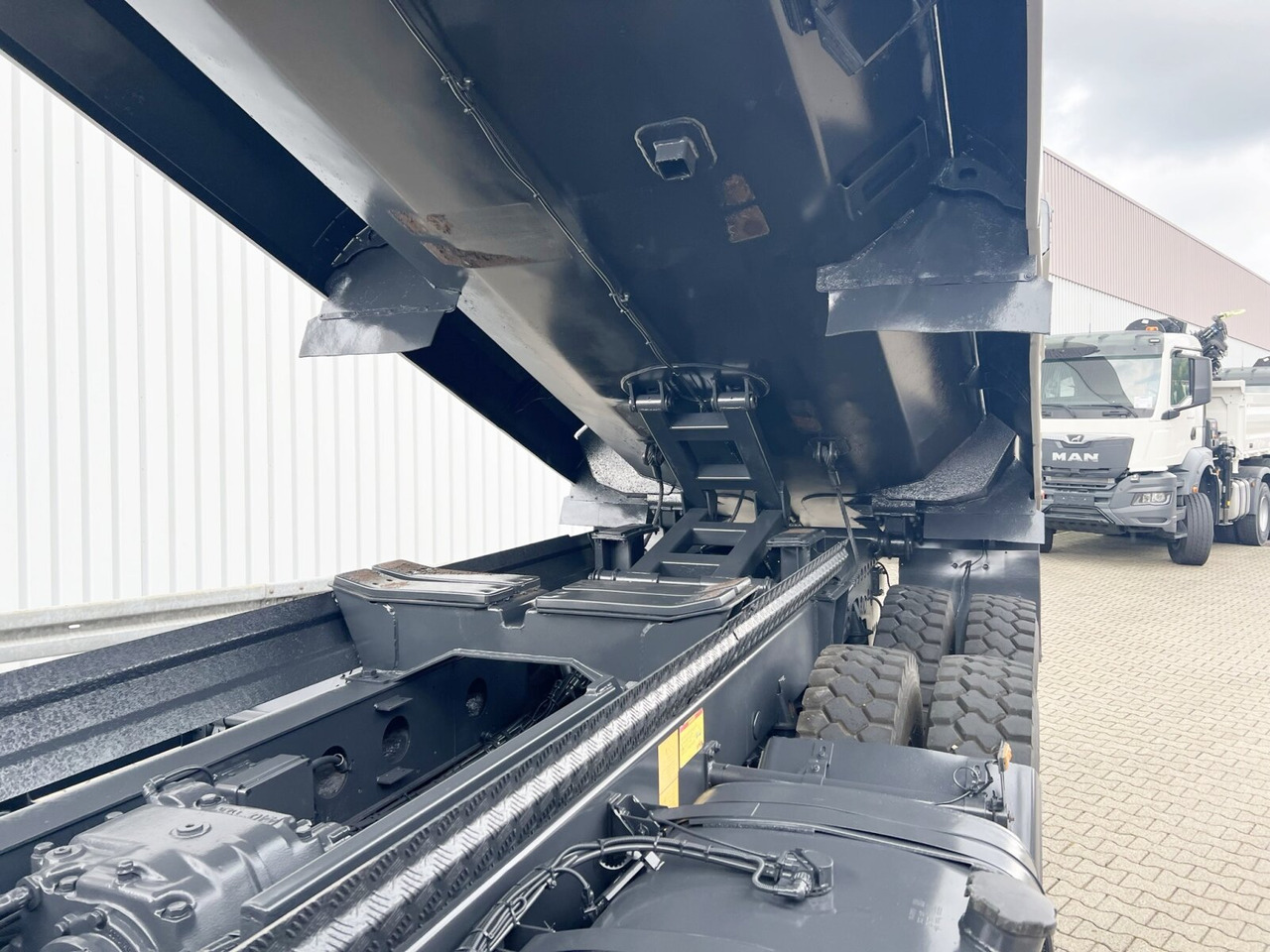 Dúmper Tatra Phoenix 8x8 Phoenix 8x8, Stahlmulde ca. 22m³, hydr. Heckklappe: foto 7 Dúmper Tatra Phoenix 8x8 Phoenix 8x8, Stahlmulde ca. 22m³, hydr. Heckklappe: foto 7