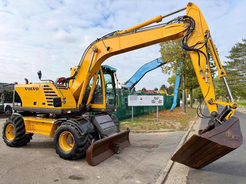 Volvo EW 140 B *FULL HYDR* - BLADE - 10.485h - TILT BUCKET - CE - NL MACHINE - GOOD CONDITION - Excavadora de ruedas: foto 1 Volvo EW 140 B *FULL HYDR* - BLADE - 10.485h - TILT BUCKET - CE - NL MACHINE - GOOD CONDITION - Excavadora de ruedas: foto 1