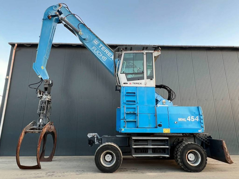 Manipulador de materiales para transporte de basura Fuchs MHL454: foto 5