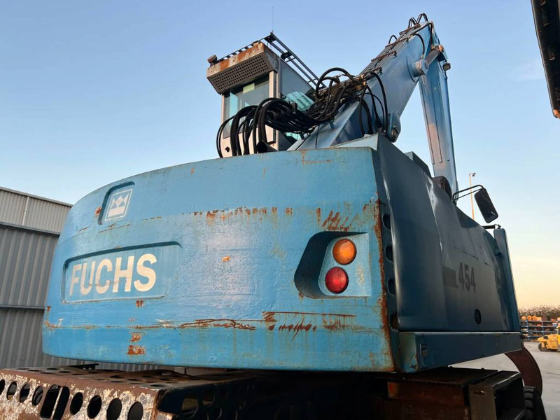 Manipulador de materiales para transporte de basura Fuchs MHL454: foto 10