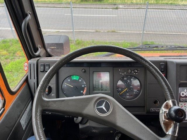 Camión volquete Mercedes-Benz Unimog 418/10 Winterdienst2000: foto 21