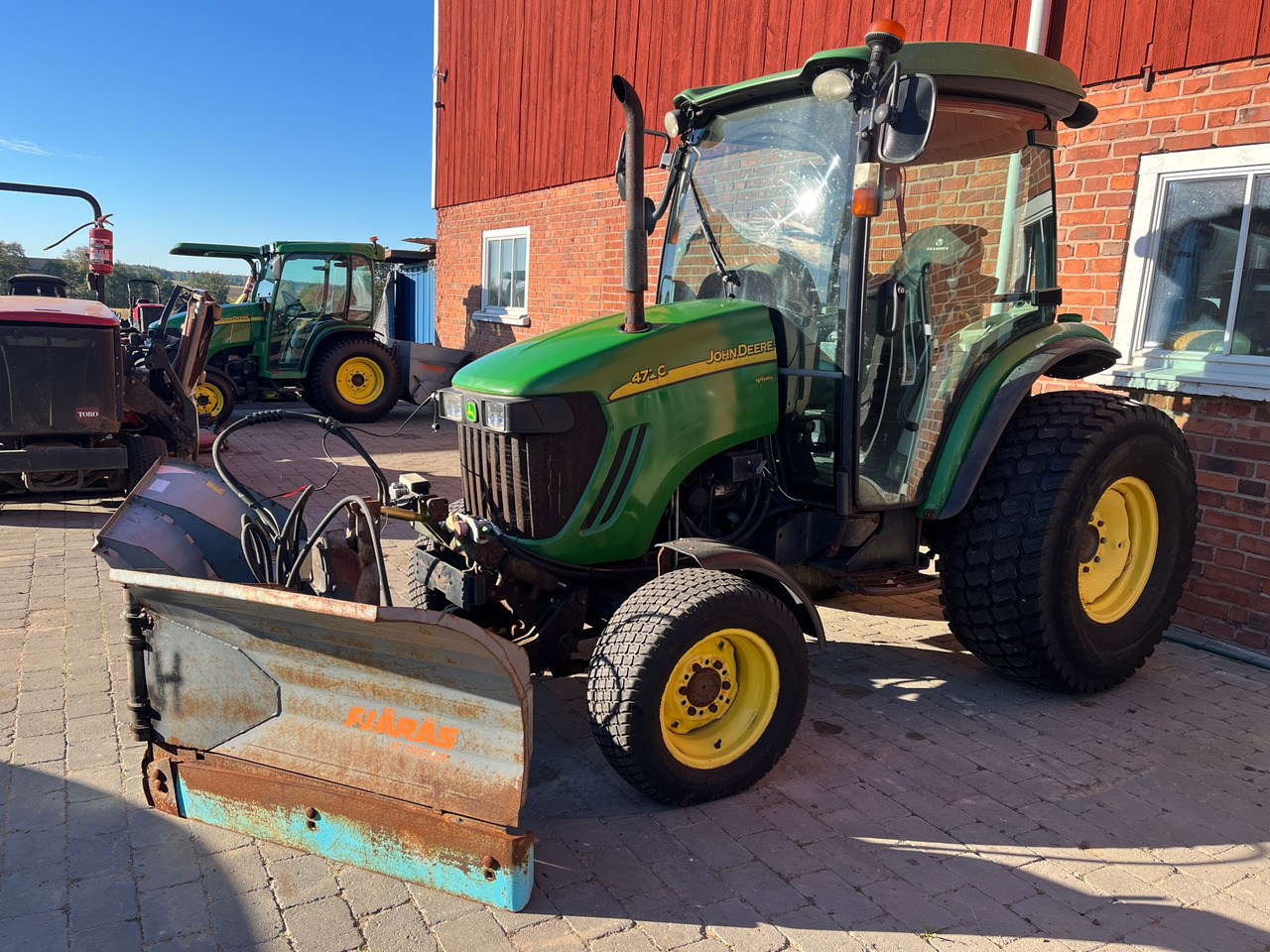 John Deere 4720 - Tractor: foto 1 John Deere 4720 - Tractor: foto 1