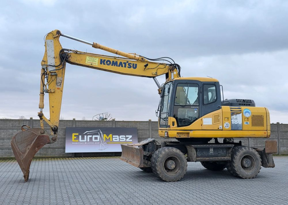 Komatsu PW 180-7EO, 2007 ROK, PODPORY + PŁUG - Excavadora de ruedas: foto 1 Komatsu PW 180-7EO, 2007 ROK, PODPORY + PŁUG - Excavadora de ruedas: foto 1