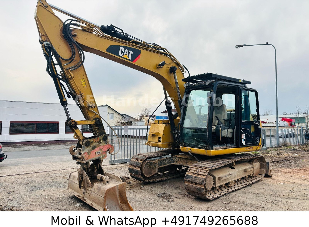 CAT 311D *6600Std./Schnellwechsler/Schaufel/Klima - Excavadora de cadenas: foto 1 CAT 311D *6600Std./Schnellwechsler/Schaufel/Klima - Excavadora de cadenas: foto 1