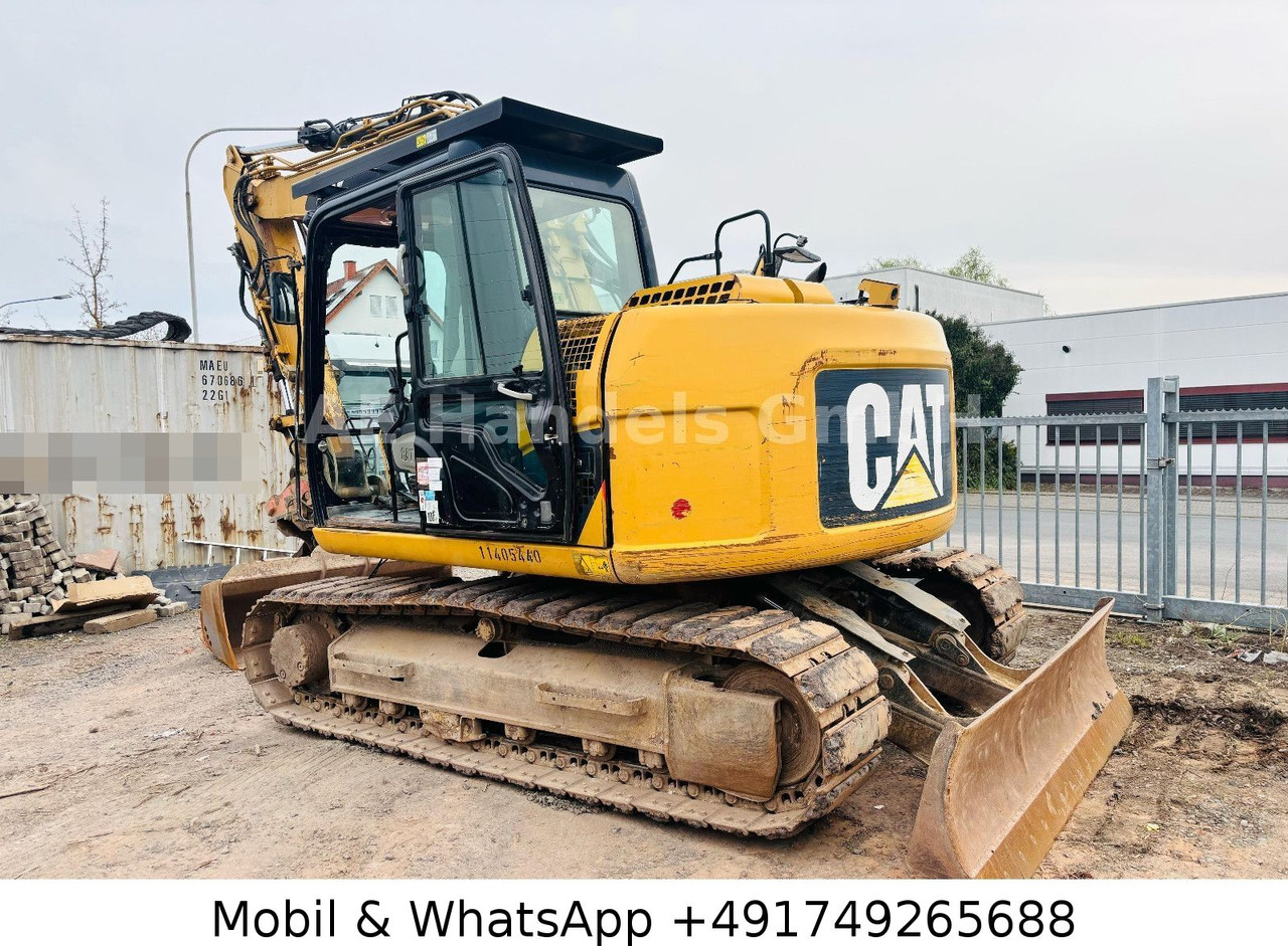 CAT 311D *6600Std./Schnellwechsler/Schaufel/Klima - Excavadora de cadenas: foto 5 CAT 311D *6600Std./Schnellwechsler/Schaufel/Klima - Excavadora de cadenas: foto 5