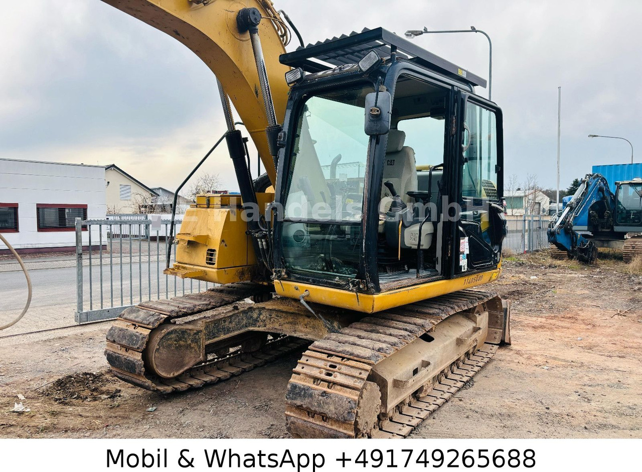 CAT 311D *6600Std./Schnellwechsler/Schaufel/Klima - Excavadora de cadenas: foto 2 CAT 311D *6600Std./Schnellwechsler/Schaufel/Klima - Excavadora de cadenas: foto 2