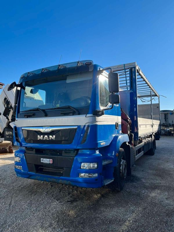MAN TGM 18.340 - FASSI KRAN / RAMPE - Camión, Camión grúa: foto 1 MAN TGM 18.340 - FASSI KRAN / RAMPE - Camión, Camión grúa: foto 1