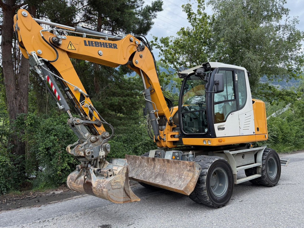 Liebherr A910 Compact Litronic,4 Schaufeln,Schnellwechsle - Excavadora de ruedas: foto 4 Liebherr A910 Compact Litronic,4 Schaufeln,Schnellwechsle - Excavadora de ruedas: foto 4