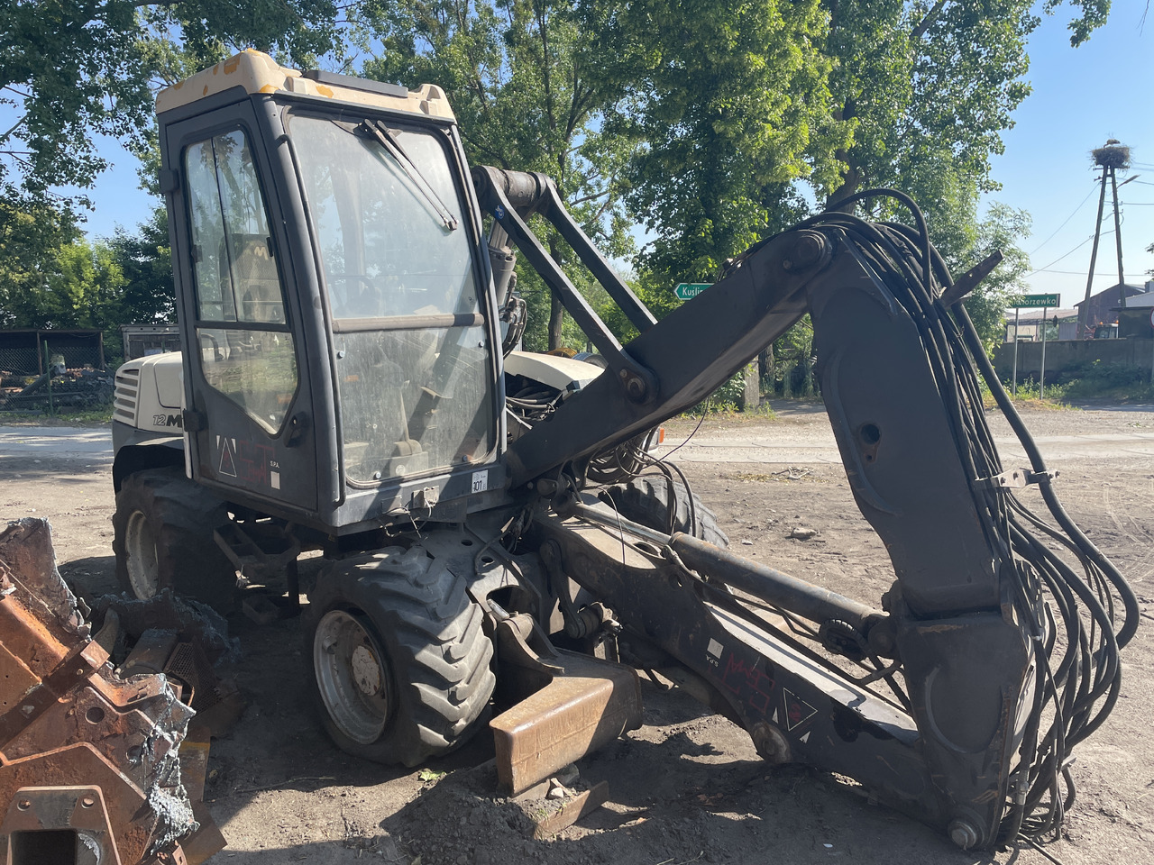 Mecalac 12MXT 12 MXT - części - kabina mosty siłowniki koła zwolnica skrzynia - Mando final para Maquinaria agrícola: foto 2 Mecalac 12MXT 12 MXT - części - kabina mosty siłowniki koła zwolnica skrzynia - Mando final para Maquinaria agrícola: foto 2