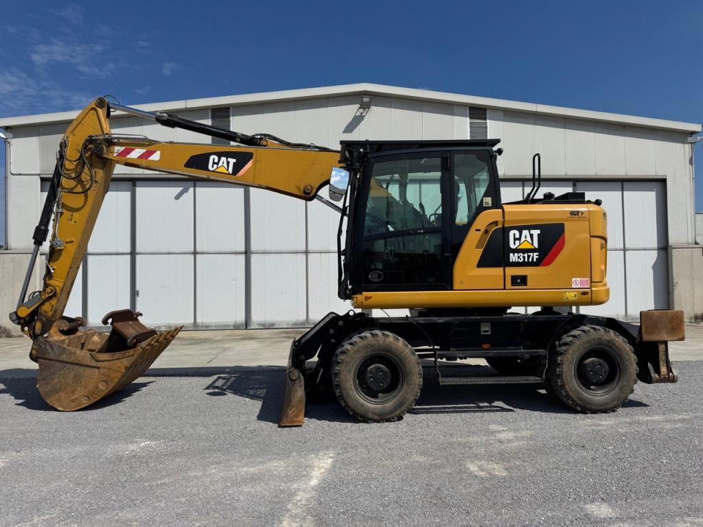 Caterpillar M317F - Excavadora de ruedas: foto 1 Caterpillar M317F - Excavadora de ruedas: foto 1