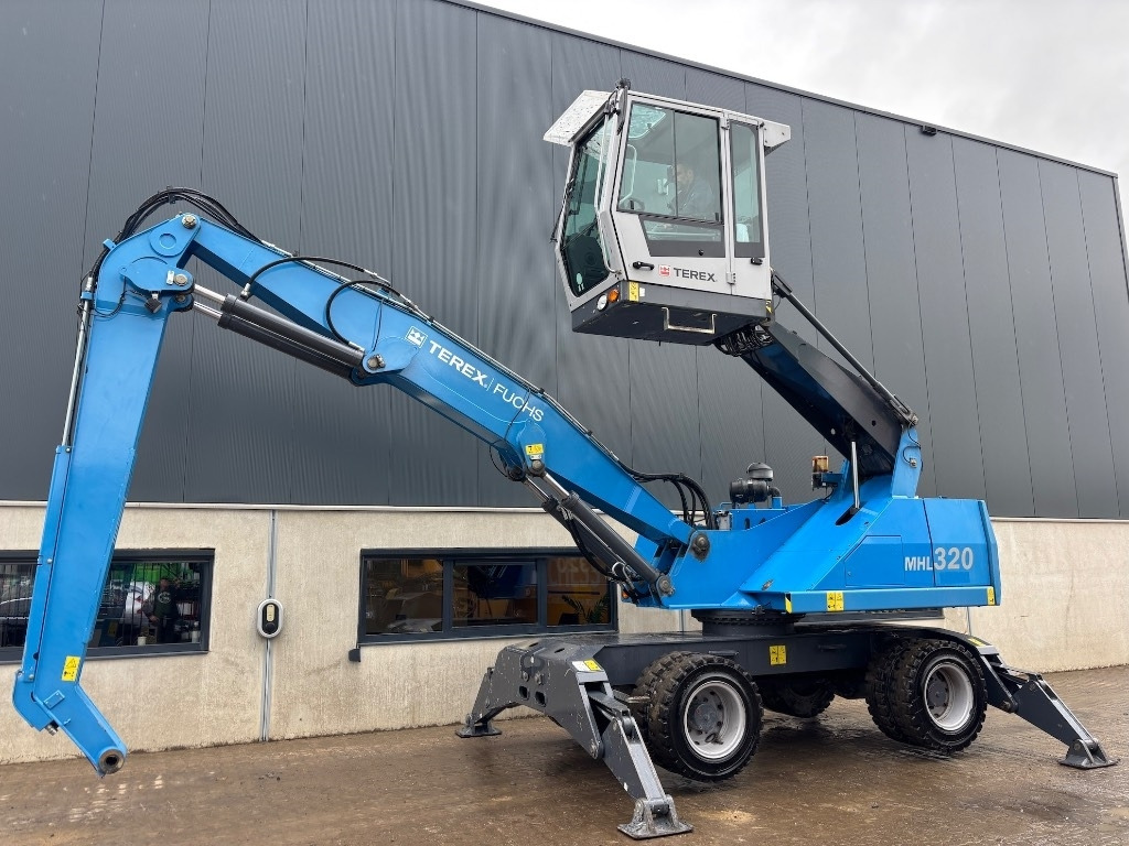 Fuchs MHL 320 D - Manipulador de materiales: foto 1 Fuchs MHL 320 D - Manipulador de materiales: foto 1