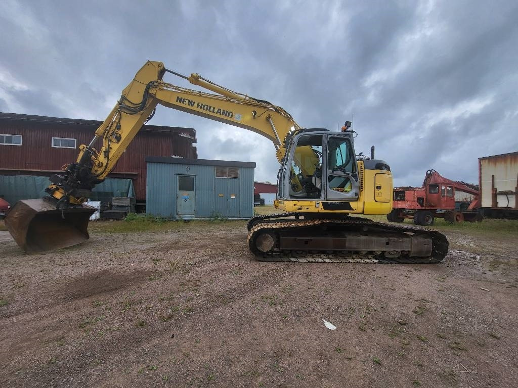 New Holland Kobelco E 235 B SR-2 - Excavadora de cadenas: foto 2 New Holland Kobelco E 235 B SR-2 - Excavadora de cadenas: foto 2