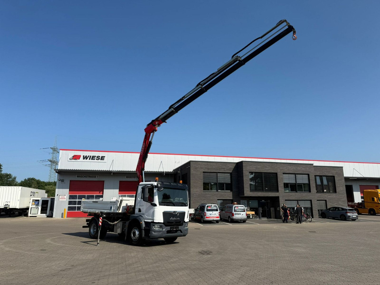 MAN TGM 18.320 4x2 BB mit Kran Fassi F135 Kipper - Camión volquete, Camión grúa: foto 2 MAN TGM 18.320 4x2 BB mit Kran Fassi F135 Kipper - Camión volquete, Camión grúa: foto 2