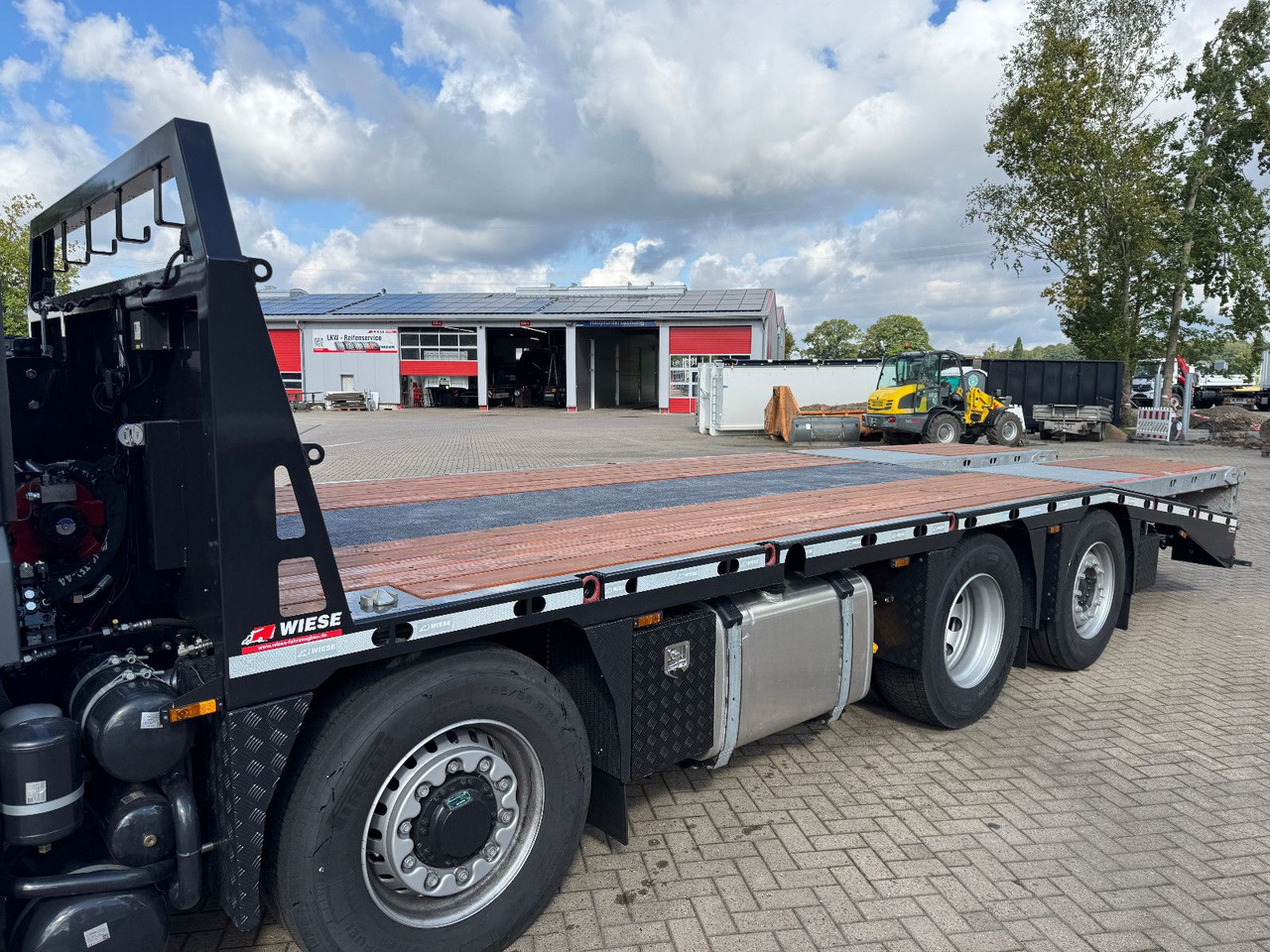 MAN TGS 35.520 Hydro Baumaschinentransporter - Grua de remolque autos: foto 2 MAN TGS 35.520 Hydro Baumaschinentransporter - Grua de remolque autos: foto 2