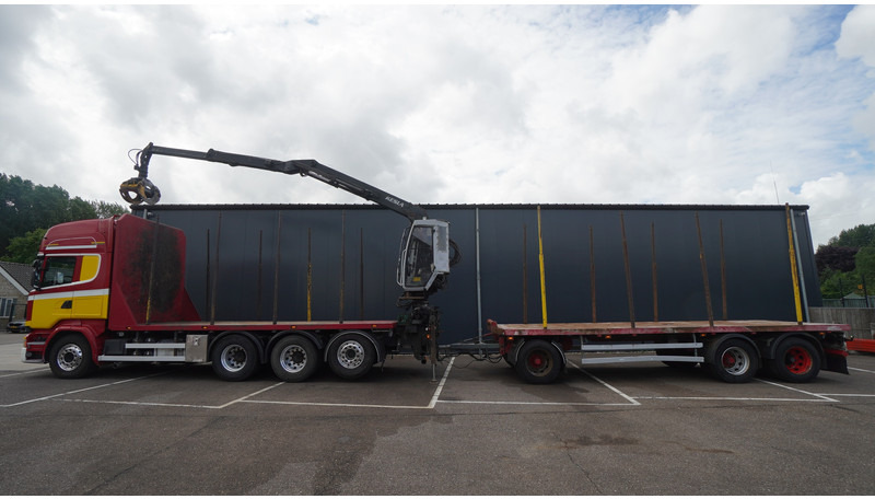 Scania R 580 V8 8X4 LOGTRANSPORT COMBI WITH MTDK YEAR 2012 TRAILER KESLA 46 CRANE - Camión forestal, Camión grúa: foto 1 Scania R 580 V8 8X4 LOGTRANSPORT COMBI WITH MTDK YEAR 2012 TRAILER KESLA 46 CRANE - Camión forestal, Camión grúa: foto 1