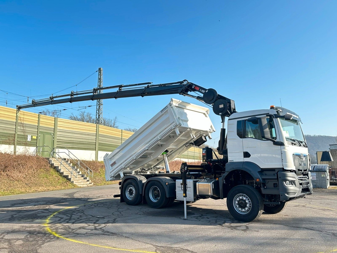 MAN TGS 28.440 6x4-4/3-Seiten- Kipper / Hiab 228-6 - Camión volquete, Camión grúa: foto 1 MAN TGS 28.440 6x4-4/3-Seiten- Kipper / Hiab 228-6 - Camión volquete, Camión grúa: foto 1