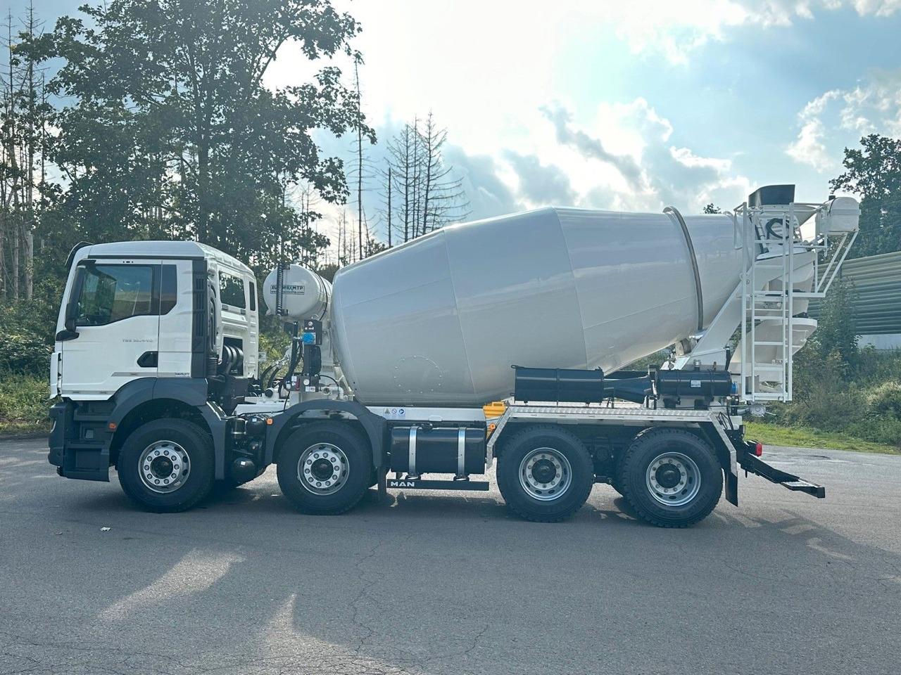 MAN TGS 32.440 8x4 / Euromix MTP EM 9 L - Camión hormigonera: foto 4 MAN TGS 32.440 8x4 / Euromix MTP EM 9 L - Camión hormigonera: foto 4