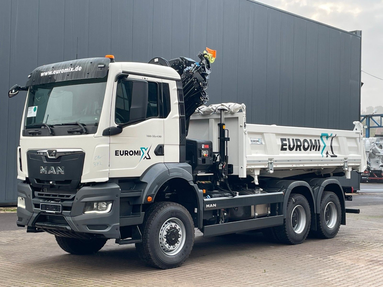 MAN TGS 33.440 6x6 /3-Seiten- Kipper / HIAB 228-6 - Camión volquete, Camión grúa: foto 3 MAN TGS 33.440 6x6 /3-Seiten- Kipper / HIAB 228-6 - Camión volquete, Camión grúa: foto 3