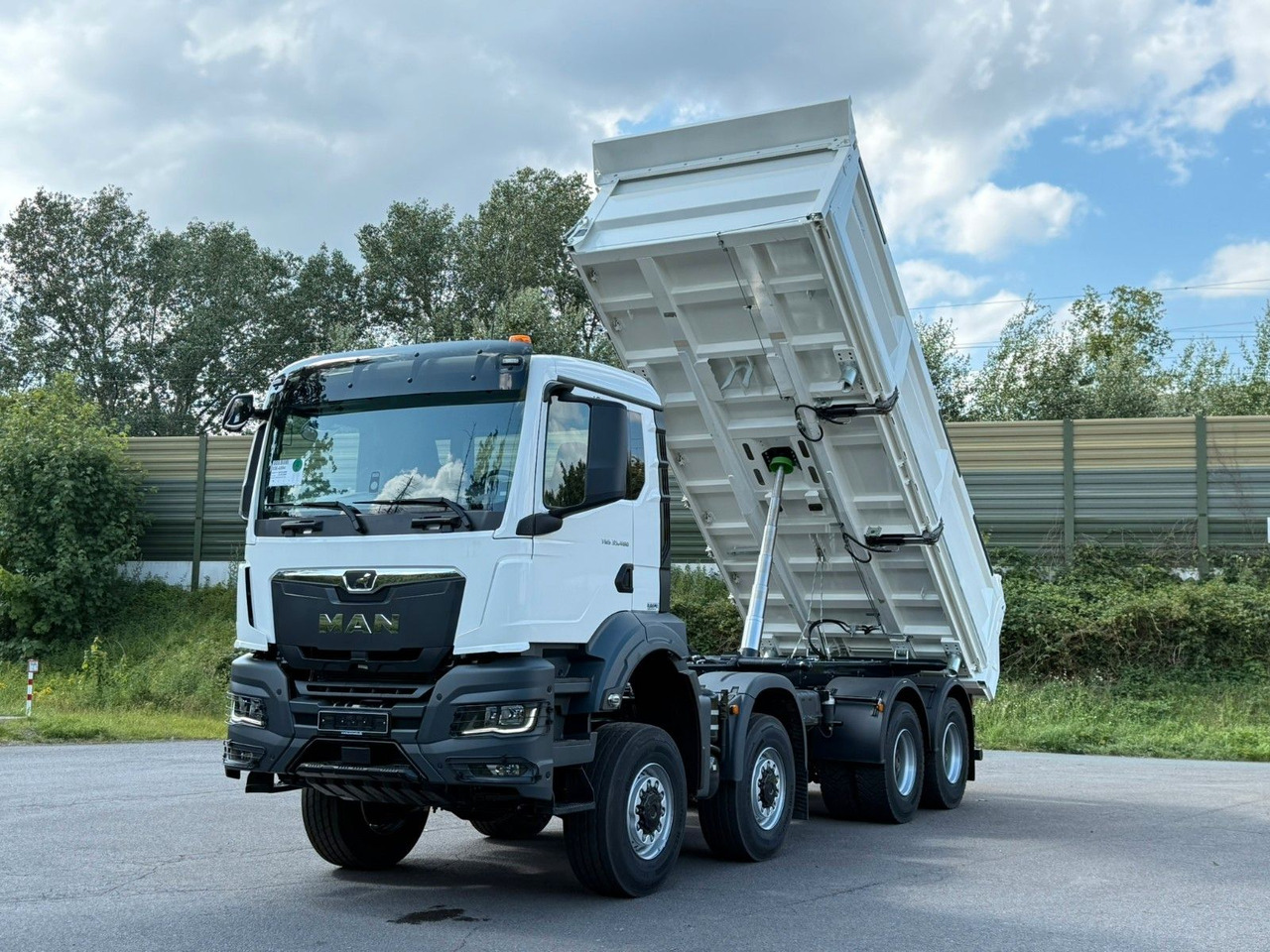 MAN TGS 35.480 8x8 EuromixMTP 3-Seiten-Kipper - Camión volquete: foto 2 MAN TGS 35.480 8x8 EuromixMTP 3-Seiten-Kipper - Camión volquete: foto 2