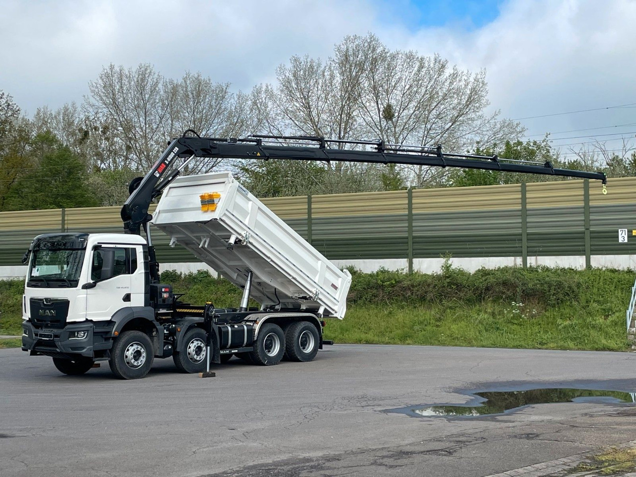 MAN TGS 41.480 8x4/Euro6e Euromix Kipper Hiab 228-6 - Camión volquete, Camión grúa: foto 1 MAN TGS 41.480 8x4/Euro6e Euromix Kipper Hiab 228-6 - Camión volquete, Camión grúa: foto 1