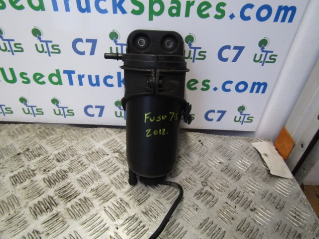 MITSUBISHI FUSO / CANTER FUEL FILTER HOUSING MK666099 - Motor y piezas para Camión: foto 1 MITSUBISHI FUSO / CANTER FUEL FILTER HOUSING MK666099 - Motor y piezas para Camión: foto 1