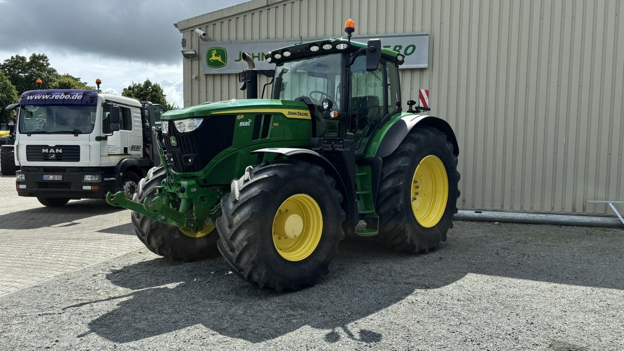 John Deere 6R195 - Tractor: foto 1 John Deere 6R195 - Tractor: foto 1