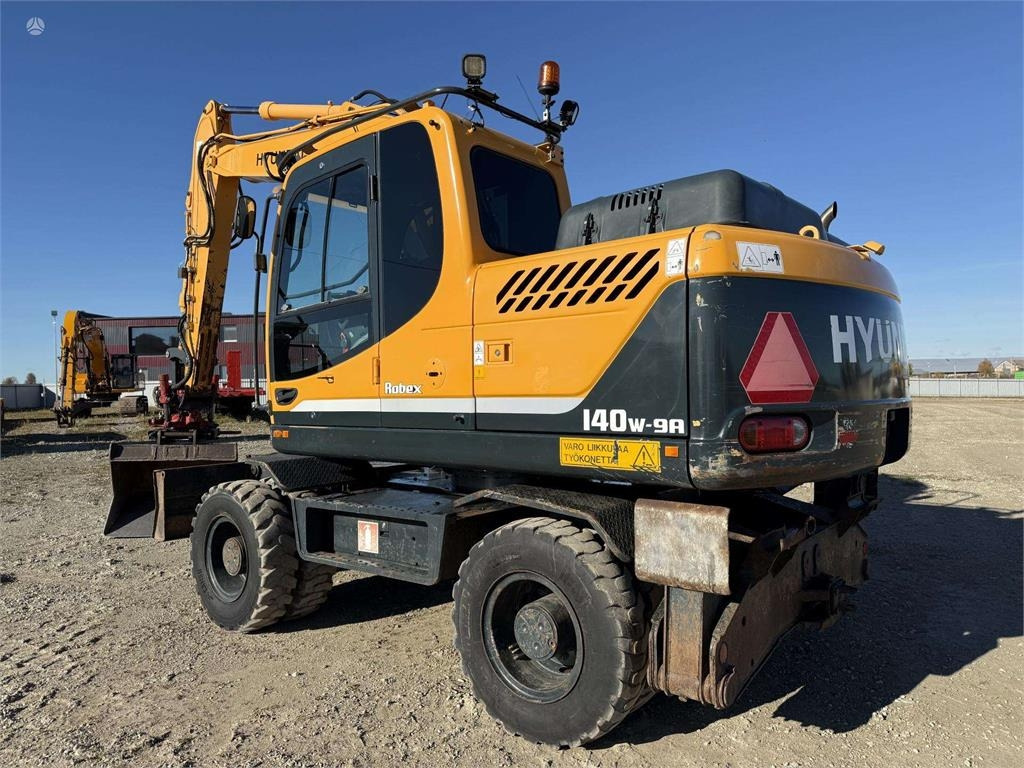 Hyundai Robex 140 W-9A Rototilt + grap - Excavadora de ruedas: foto 3 Hyundai Robex 140 W-9A Rototilt + grap - Excavadora de ruedas: foto 3